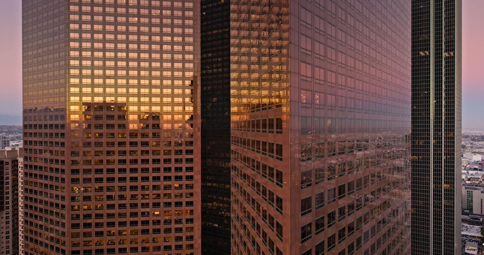 DTLA City Reflection on Financial Skyscraper at Sunset - Aerial